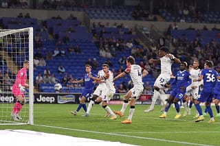 Gabe Osho volleys home his first ever goal for the Hatters at Cardiff in midweek - pic: Getty Images
